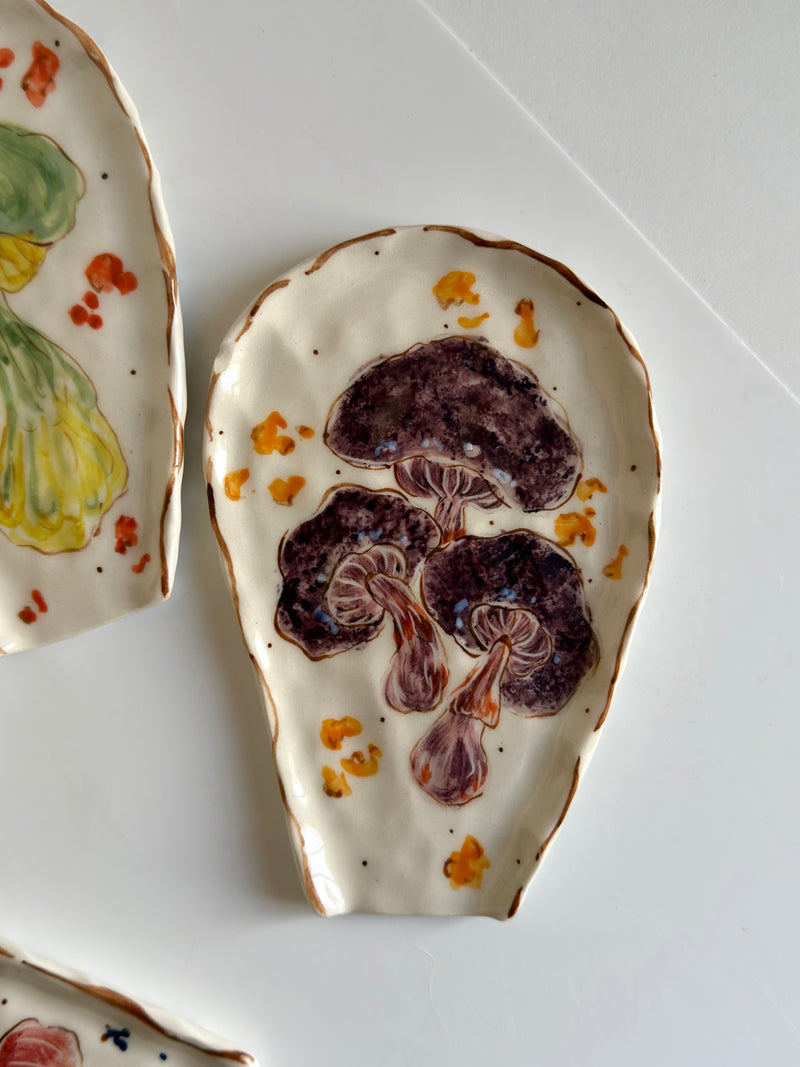 Purple violet webcap mushroom spoon rest with tiny orange dots