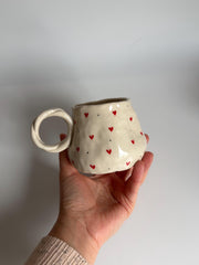 In a room full of art Mug