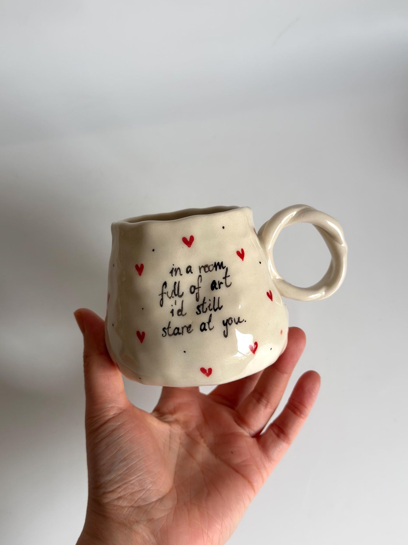In a room full of art Mug